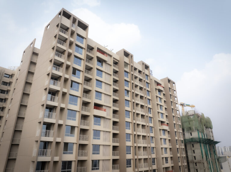 homebuyers discussing property investment with real estate developer